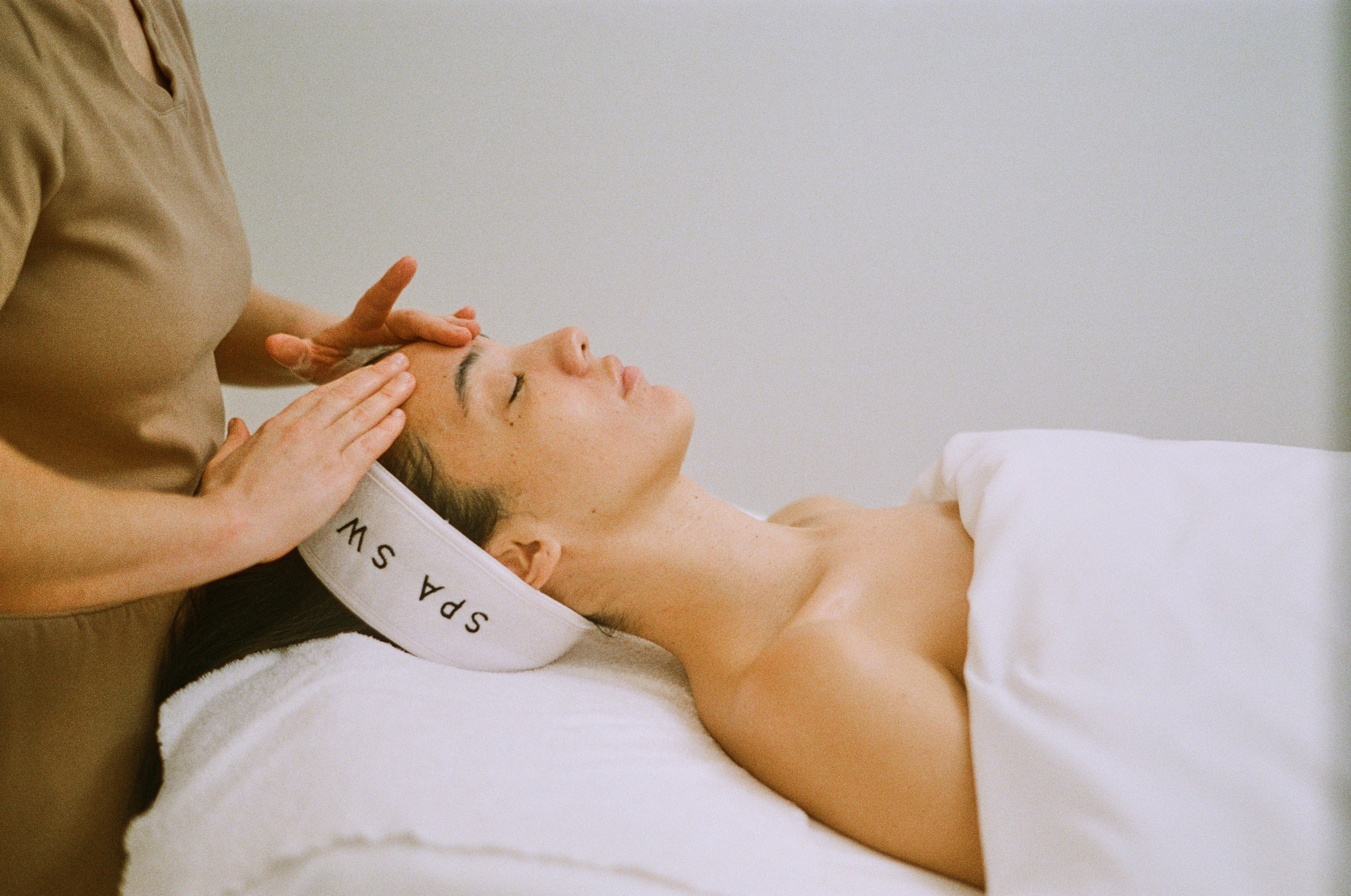 Clean, professional medical spa treatment room with neutral tones at Spa Sway Day + Med Spa | Domain in Austin